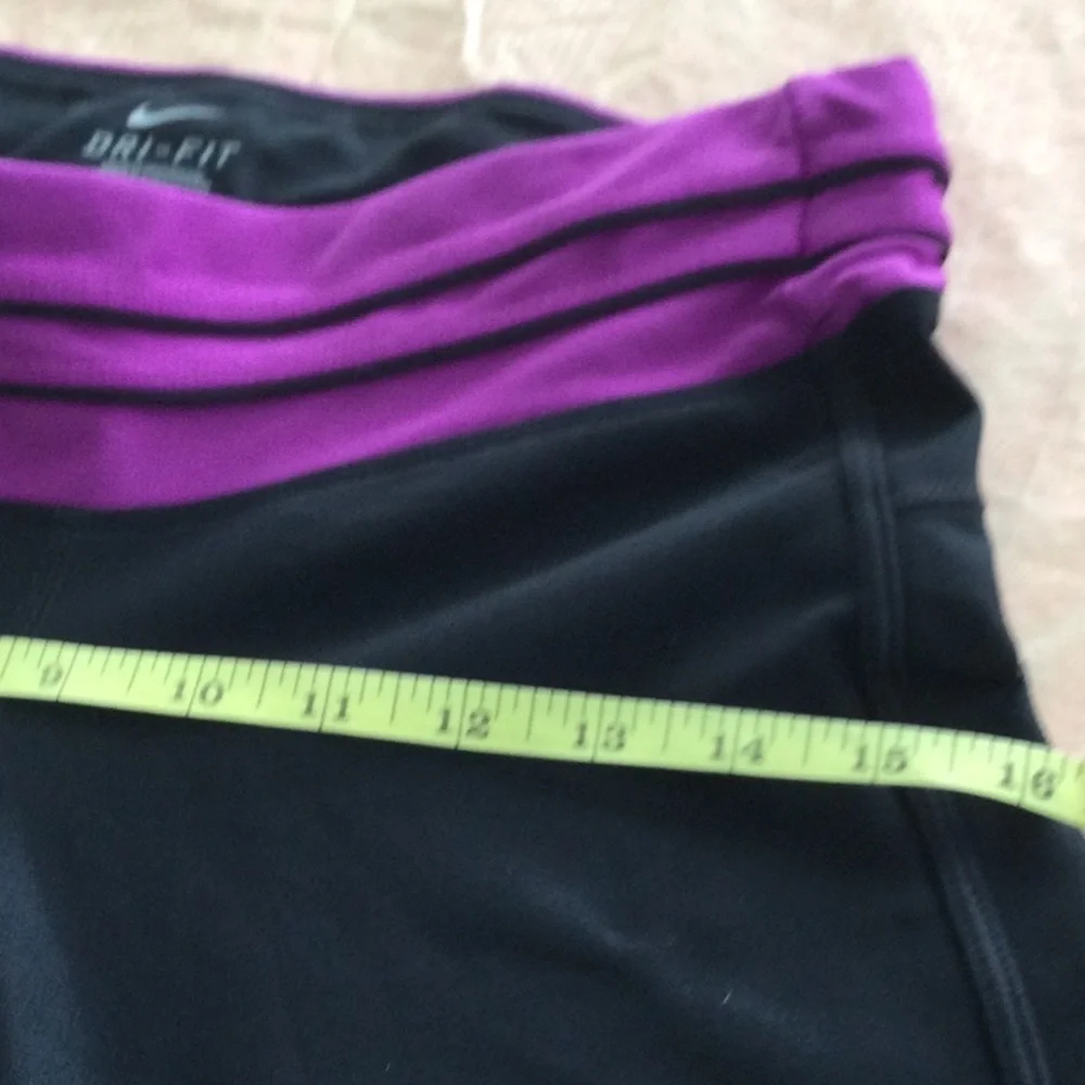 Woman’s Nike Running size M washable color black & purple.    #432